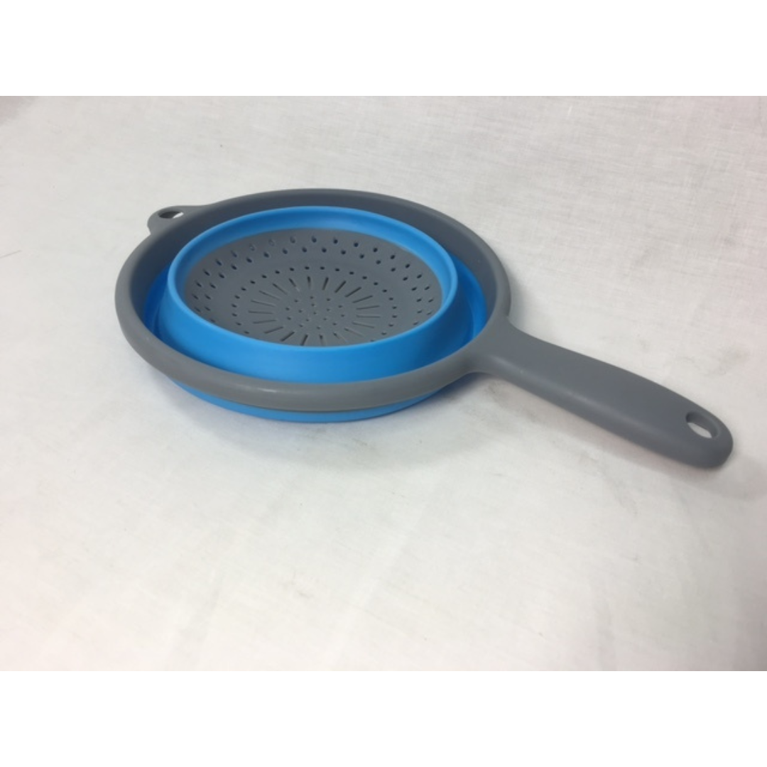 Blue collapsible silicone colander with handle, folds flat to 3.3cm for caravans or small kitchens