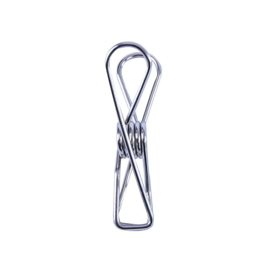 Metal clothes pin on a white background