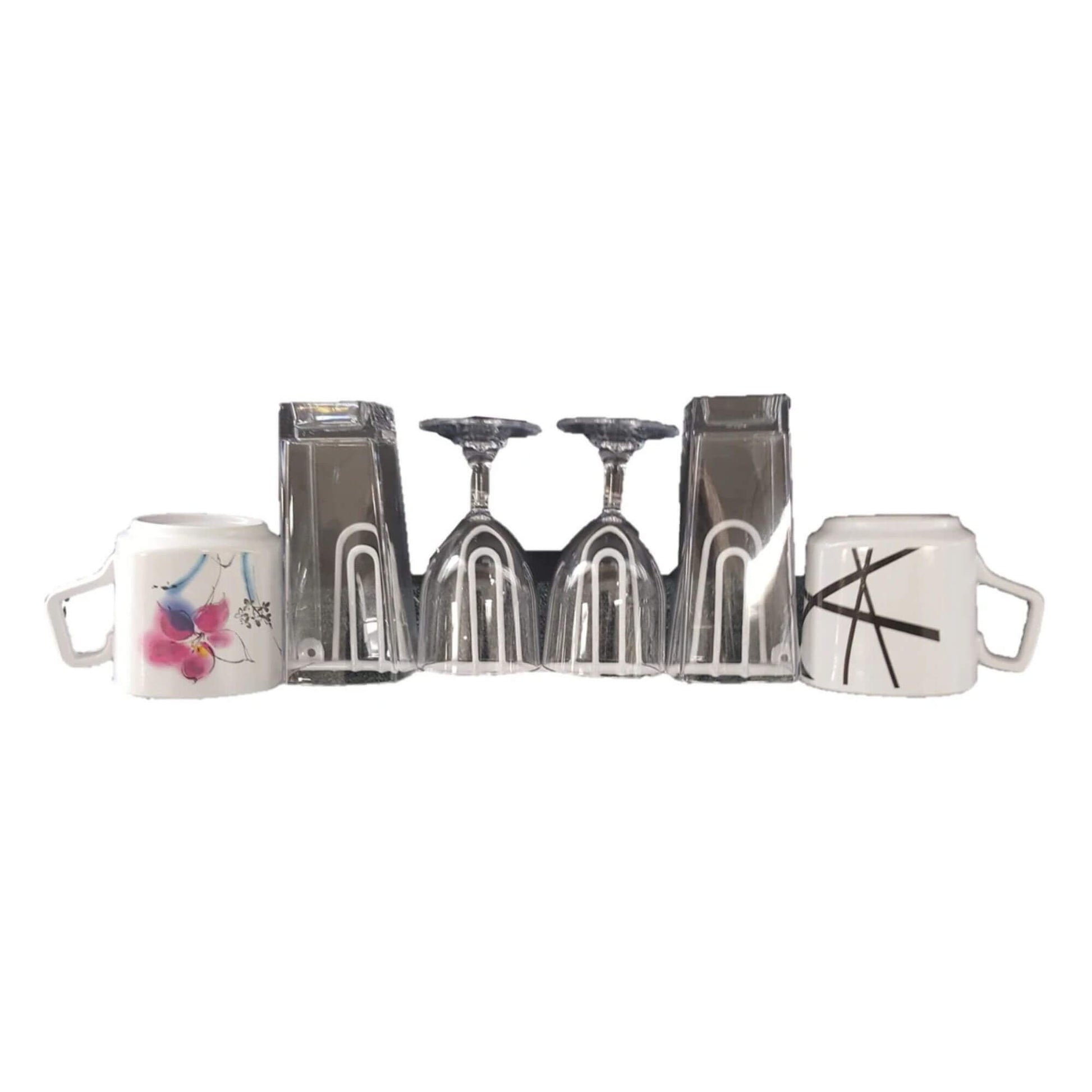 Set of silver wine glasses and mugs on a white background