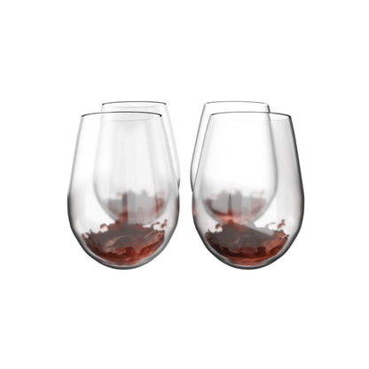 Two stemless wine glasses filled with red wine on a white background