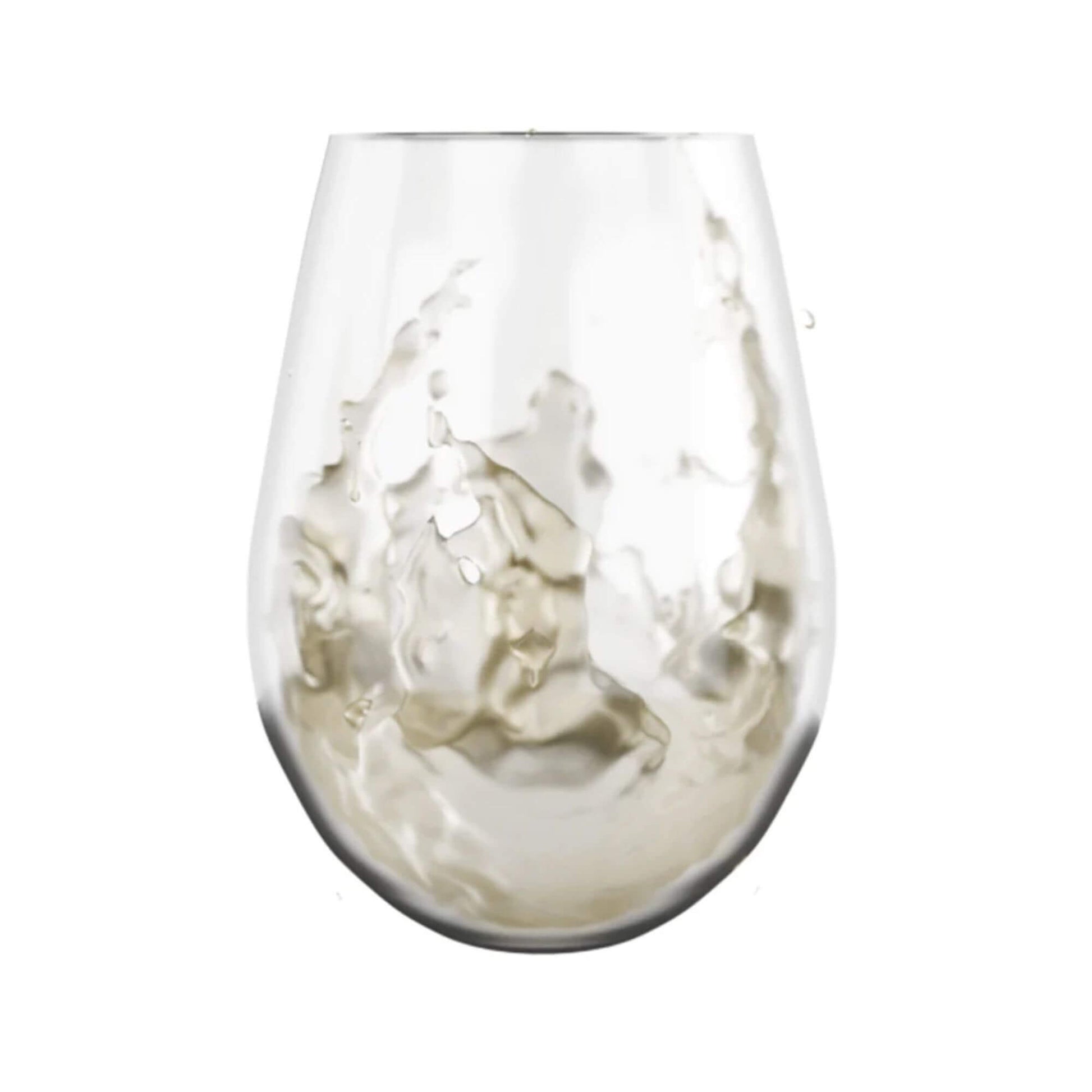 Clear wine glass filled with white wine on a white background