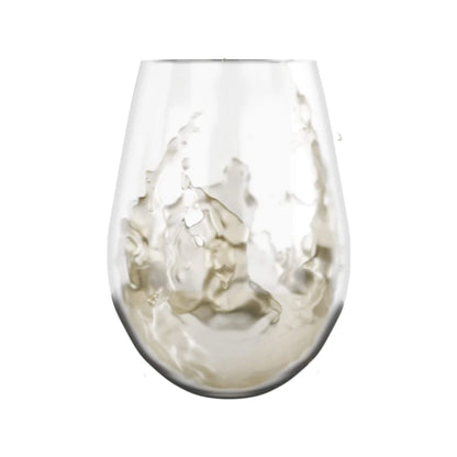 Clear wine glass filled with white wine on a white background