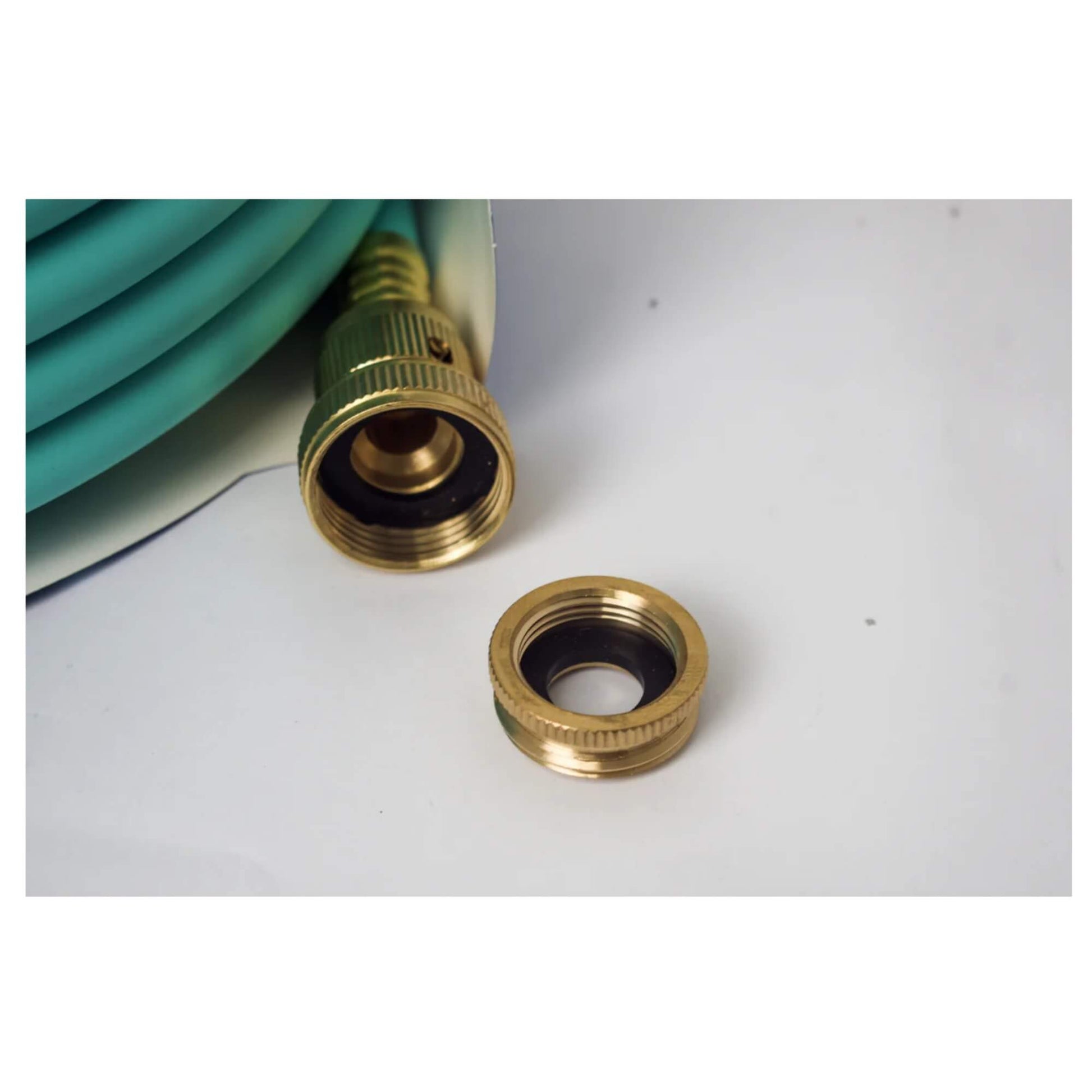 Brass hose connector with additional female fitting shown next to 12mm Flomaster hose